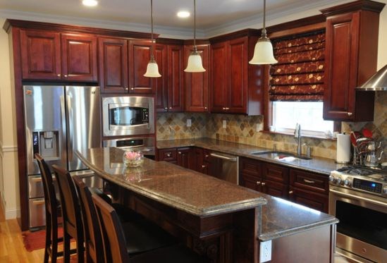 Mahogany Kitchnes: Dark wood kitchens by Blue Granite Kitchen designs