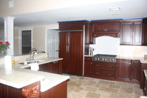 Mahogany Kitchnes: Dark wood kitchens by Blue Granite Kitchen designs